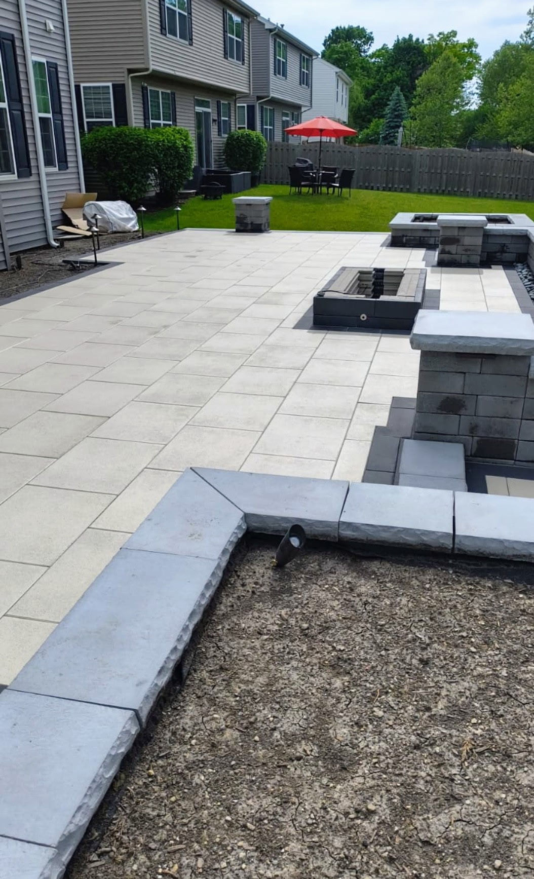 Paver patio with built-in fire features